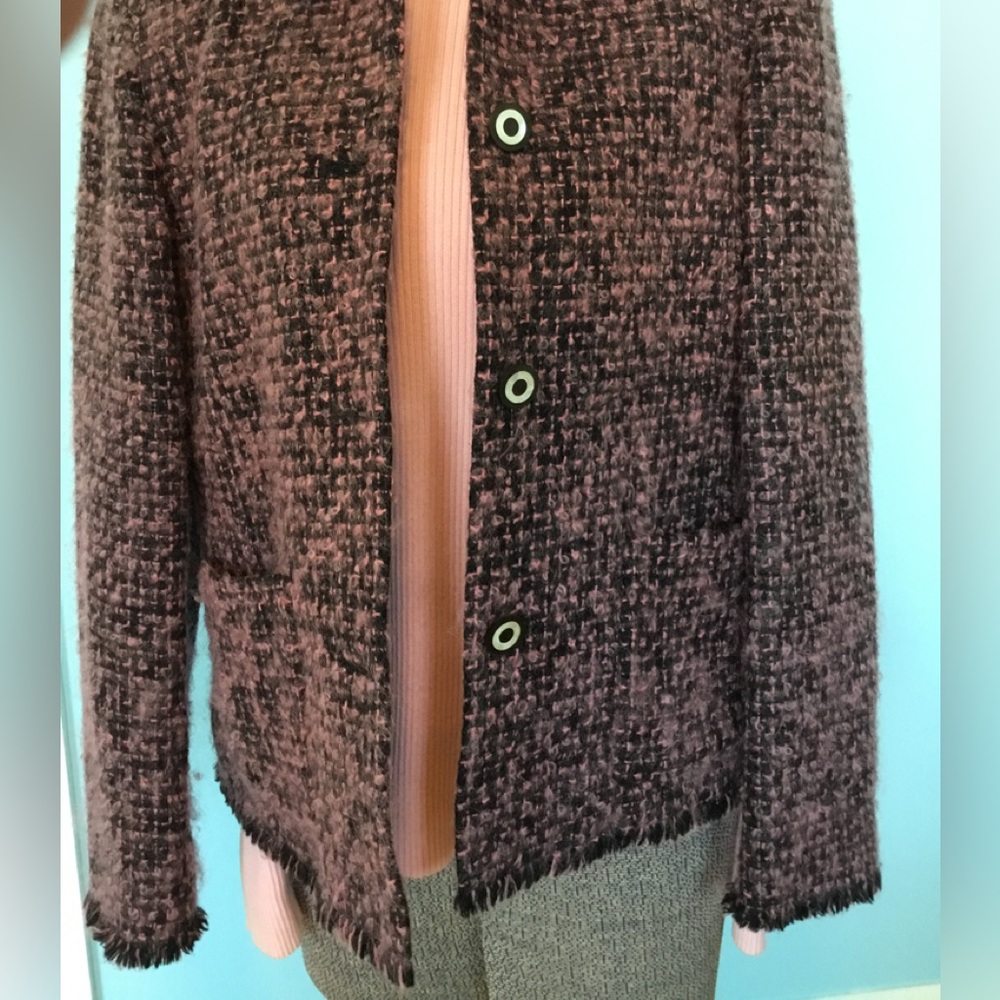 Great soft pink turtle neck along with bucle pink and black jacket